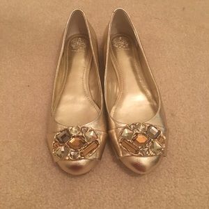 Vince Camuto gold flats.